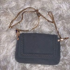 Grey with gold over the shoulder strap